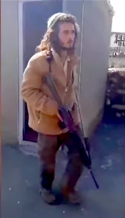 An Israeli settler with a rifle